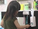 toothpaste dispenser with 5 toothbrush hanging